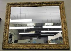 A large gilt framed Morris mirror