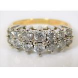 An 18ct gold ring set with 1.8ct of diamond 6g siz