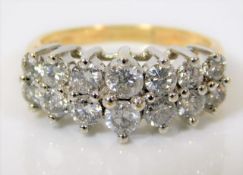 An 18ct gold ring set with 1.8ct of diamond 6g siz