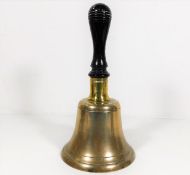 An antique school bell 10in high