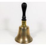 An antique school bell 10in high