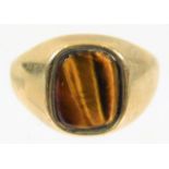 A 9ct gold ring set with tiger eye 3.6g size N