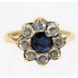 A 9ct gold ring set with blue & white stones 2.8g