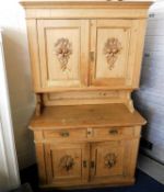 A Victorian pine kitchen dresser with green man de