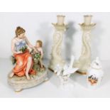 A continental porcelain figure group twinned with