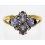 A 9ct gold ring set with amethyst & white stones 2