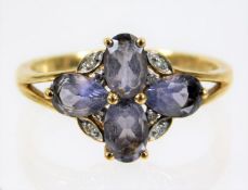 A 9ct gold ring set with amethyst & white stones 2