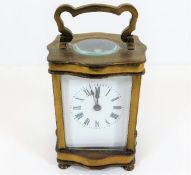 A brass carriage clock 5.25in high