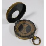 A Francis Barker & Son brass compass "The Guide"