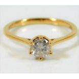 An 18ct gold ring with 0.6ct H colour certified di