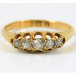 An 18ct gold antique ring set with five diamonds of approx. 0.4ct old cut 2.3g size L