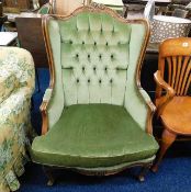 A Victorian upholstered armchair.