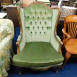 A Victorian upholstered armchair.