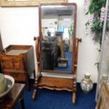 A large Victorian mahogany cheval mirror. Provenan