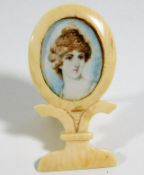 A small 19thC. ivory mounted miniature portrait wa