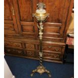 A 19thC. ornate brass rise & fall lamp 63in tall 8