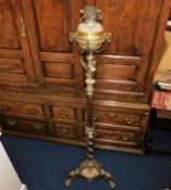 A 19thC. ornate brass rise & fall lamp 63in tall 8