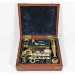 A Victorian boxed brass field microscope & slides