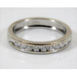 An 18ct white gold half eternity ring approx. 0.4c