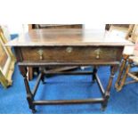 An 18thC. oak side table with drawer & brass fitti