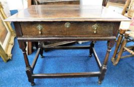 An 18thC. oak side table with drawer & brass fitti