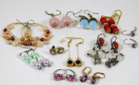 A quantity of mixed metal mounted fashion earrings