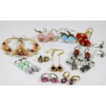 A quantity of mixed metal mounted fashion earrings