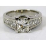 A fine platinum diamond ring set with centre stone