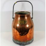 A c.1800 copper milk churn with brass plaque 21.5i