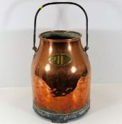 A c.1800 copper milk churn with brass plaque 21.5i