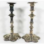 A pair of Victorian silver plated candlesticks