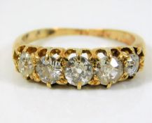 An antique yellow metal ring, tests as 18ct gold s