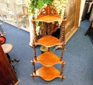 A Victorian mahogany whatnot with barley twist sup
