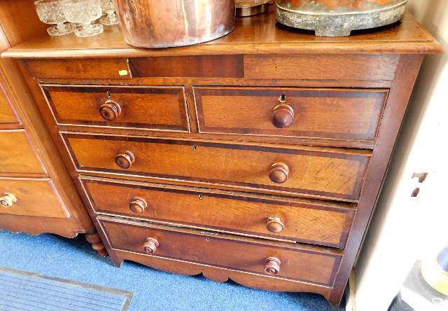 An oak Scottish chest of drawers with recessed dra