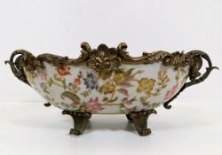 A French bronze mounted Limoge style porcelain bow