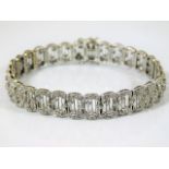 A white metal bracelet set with 3ct diamond & test