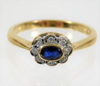 An antique 9ct gold ring set with 0.6ct diamond &