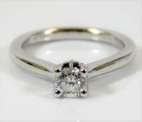 An 18ct white gold Vera Wang ring with 0.57ct main
