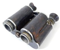 A pair of early 20thC. military style binoculars