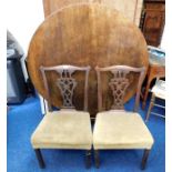 A pair of 19thC. Chippendale style mahogany dining