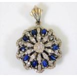 An 18ct white gold pendant set with diamond & sapphire 6.6g, lacking one sapphire