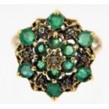 A 9ct gold ring set with green & white stones 2.8g