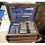 An oak cased cutlery cabinet