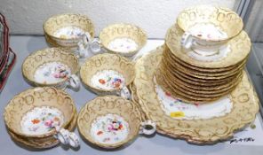 A hand decorated decorative floral & gilded 22 pie