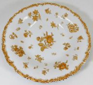 A large Meissen dot period gilded plate with relie