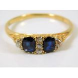 An antique 18ct gold ring set with sapphire & old