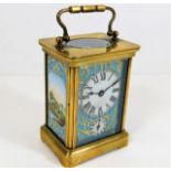 A French brass carriage clock with Sevres style po