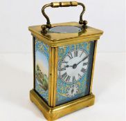 A French brass carriage clock with Sevres style po