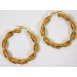 A pair of 9ct gold twist earrings 3.5g, 1.5in diam