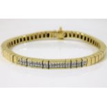 A 14ct gold bracelet set with approx. 1ct diamonds